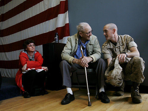 First Place, News Picture Story - Eric Albrecht / The Columbus DispatchPrivate Scott Thompson 19 of Frankfort talks to his grandfather Norbert Fawley 89 who served in WWII before departing for service.