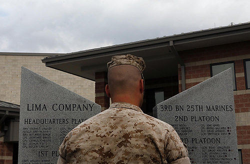 First Place, News Picture Story - Eric Albrecht / The Columbus DispatchCorporal Bryan Brumfield visits the memorial to the soldiers  who served Lima Company that was erected at the Rickenbacker Airbase.