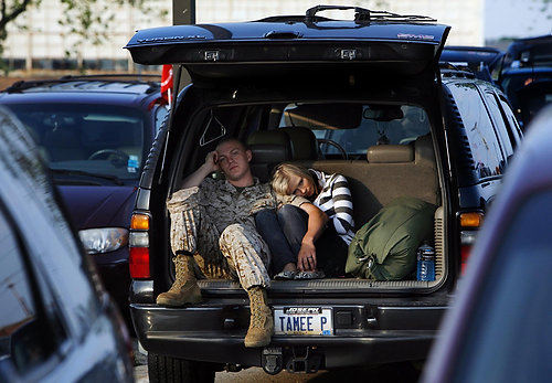 First Place, News Picture Story - ERIC ALBRECHT / The Columbus DispatchBrayden Ponchot 20 spends the waiting hours with girl friend Valerie Maynich 19 before deploying with Lima Company.