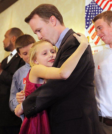 First Place, James R. Gordon Ohio Understanding Award - JOHN KUNTZ John Kuntz / The Plain DealerEd FitzGerald embraces his daughter, Bridget, on Nov. 2 after winning election as Cuyahoga County's first executive, presiding with a new 11-member County Council.    
