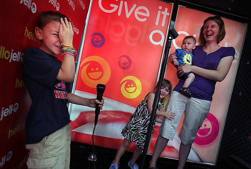 Second Place, Photographer of the Year/Large Market - Gus Chan / The Plain DealerDonovan Predovich, 5, of Avon slaps his head after recording his giggles Monday for the Hello Jell-O "Give It a Giggle" Tour, a contest that will let the winner record his or her giggle with comedian Bill Cosby in a national television spot.