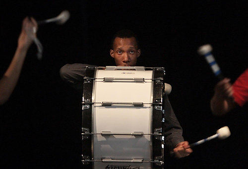 Second Place, Photographer of the Year/Large Market - Gus Chan / The Plain DealerTyrone Vaughn, of East Tech, plays the bass drum during rehearsal for the All City Ensemble's Drum Line.