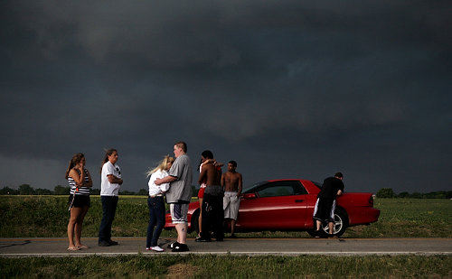 Third Place, Photographer of the Year/Large Market - Eric Albrecht / The Columbus DispatchAs storm clouds gather as friends of drowning victim Daryle Poole 18  console each other near the creek where the drowning happened.