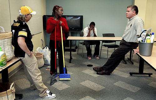 Third Place, Photographer of the Year/Large Market - Eric Albrecht / The Columbus DispatchRobert deals with personal matters while meeting at a company that offered mentoring and support to him and other teenagers in a similar situations living on their own. They were being given cleaning supplies by the employees of the company.