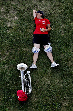 Third Place, Photographer of the Year/Large Market - Eric Albrecht / The Columbus Dispatch Marisa Moore  falls asleep with ice packs on her knees after OSU Band tryouts . Marisa who has endured Marine boot camp said the intensity of the last several days reminded her of the boot camp. 