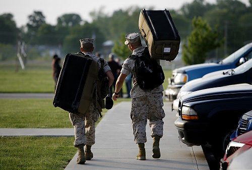 Third Place, Photographer of the Year/Large Market - Eric Albrecht / The Columbus DispatchMarines of Lima Company get ready to deploy for Afghanistan , for many of the Marines this was there first deployment and there was sense of excitement about the mission. But there was also the point of remembering and honoring those who previously served when Lima Company lost twenty two Marines and a Navy corpsman in Iraq during a tour of duty in 2005.The Marines were gathering and meeting with families for the last time before leaving for training in California and then onto Afghanistan.