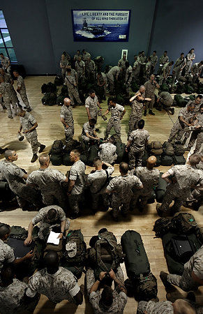 Third Place, Photographer of the Year/Large Market - Eric Albrecht / The Columbus DispatchSoldiers assemble gear after saying goodbyes to their families.