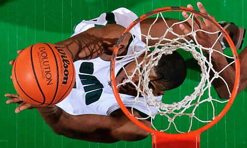 First Place, Student Photographer of the Year - Joel Hawksley / Ohio UniversityOhio forward DeVaughn Washington goes up for a dunk during the Bobcats' victory over rival Miami on February 24, 2010 at The Convo in Athens, Ohio.