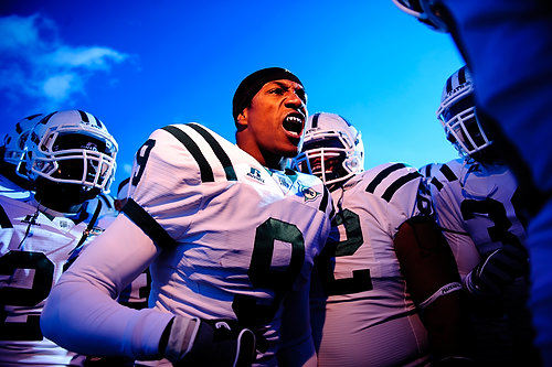 First Place, Student Photographer of the Year - Joel Hawksley / Ohio UniversityOhio cornerback Julian Posey pumps up the Bobcats before their 28-6 loss to Kent State at Dix Stadium in Kent, Ohio. Team leader Posey uses a special Fang Boil and Bite mouth guard.