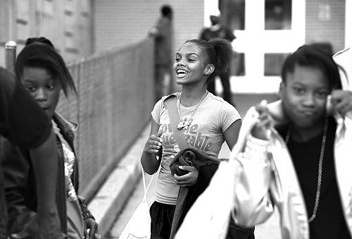 Second Place, Sports Picture Story - Carrie Cochran / Cincinnati EnquirerRaynesha walks to the car as she enjoys just a few minutes with her friends after boxing practice. She had wanted to go to a football game with them, but her dad wouldn't let her. "She's gonna focus on her schoolwork, and being in the gym," said Ray. "She's gonna focus on that until I see a difference." 
