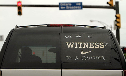 - 1st place, Team Picture Story - Marvin Fong / The Plain DealerA driver in downtown Cleveland displays a message that many Clevelanders felt. 