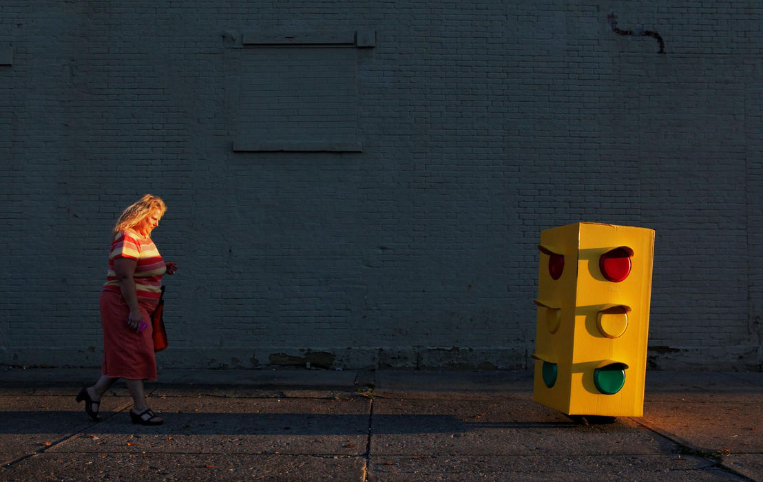 Award of Excellence, Featrue - Eric Albrecht / The Columbus DispatchAlysha Wood 10 of Newark wraps up a evening of trick or treating in Newark during the annual Halloween on the square with her mom Tina Wood trailing her on the way back to their truck. 