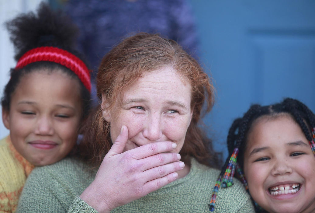 Award of Excellence, News Picture Story - Leigh Taylor / Cincinnati EnquirerTonya Hardtke is photographed with her daughters Samantha, 8, left, and LaTonya, 7, at their Newport, Kentucky apartment.  Tonya is shy to smile because she needs her teeth extracted and needs a set of dentures.  She has four kids and is recently divorced.  She got her GED two years ago and was the first person in her family to get a high school diploma.  Tonya then completed the Brighton Center's Center for Employment Training and learned skills in Microsoft Office.  However, she feels that her bad teeth are now her primary barrier to getting a quality position in a business setting.  She wishes for dental work to help her smile again.  Tonya says, "New teeth would mean a great deal to me.  I want to come to work everyday and put a smile on my face."  This is part of the Wish List series, which highlights needy people in the area and then asks for reader donations.