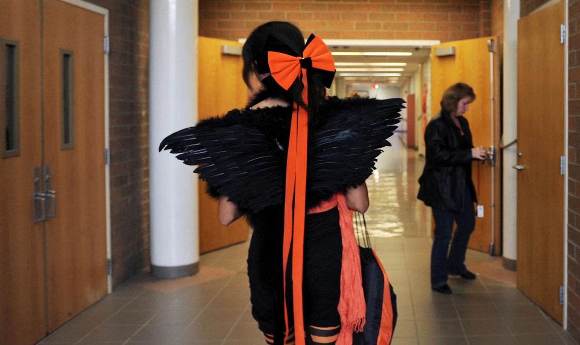 First place, James R. Gordon Ohio Understanding Award - Gary Harwood / Kent State UniversityStudent Alissa Sallah chose a unique costume to express her spirit and support for the Tigers as she makes her way to class.