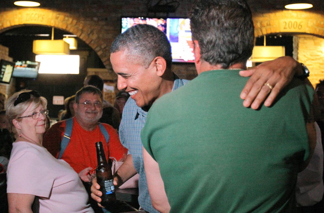 Award of Excellence, Photographer of the Year - Large Market - John Kuntz / The Plain DealerPresident Barack Obama talks with patrons at Ziggy's pub and restaurant in Amherst during a bus campaign stop July 5, 2012 en-route to Parma.  