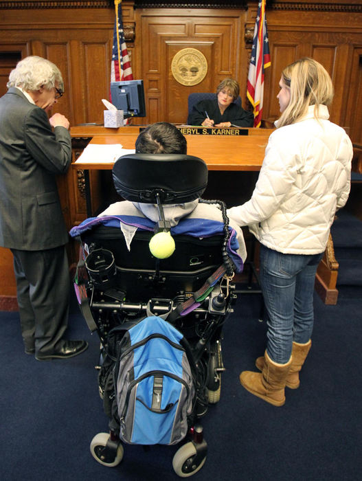 Award of Excellence, Photographer of the Year - Large Market - John Kuntz / The Plain DealerIn January, 2011, Scott and Kristy Fedor along with their lawyer, appear in court before Judge Cheryl Karner.  Six minutes later, the hearing is over. They are no longer married. A few months later, Kristy moves out of state and on with her life.