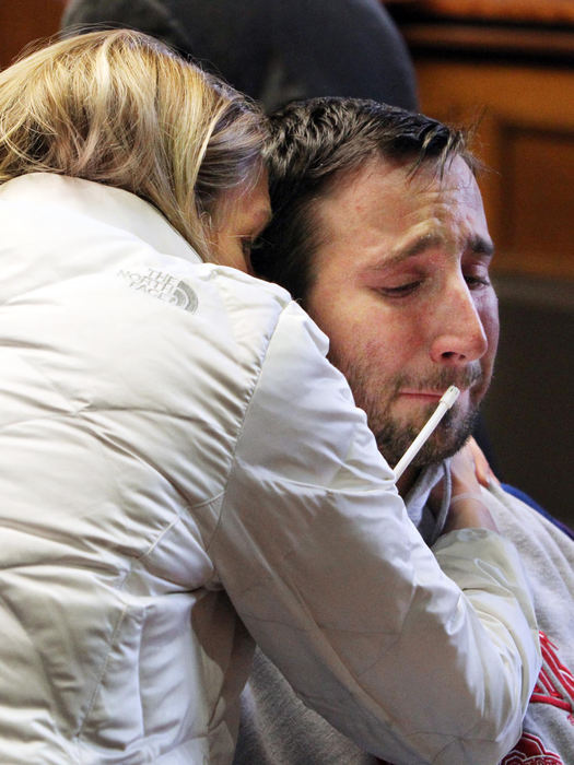 Award of Excellence, Photographer of the Year - Large Market - John Kuntz / The Plain DealerKristy and Scott Fedor cry after the annulment of their marriage in court before Judge Cheryl Karner.  A few months later, Kristy moves out of state and on with her life.