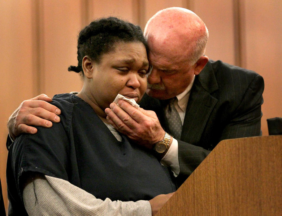 Third place, Photographer of the Year - Large Market - Marvin Fong / The Plain DealerKimberly Black, charged in the stabbing death of Sharice Swain, sheds tears with her attorney John Luskin as she enters guilty pleas on multiple counts in Cleveland, OH.  