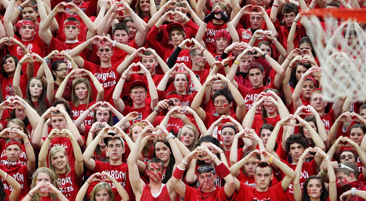 Award of Excellence, Photographer of the Year - Large Market - John Kuntz / The Plain DealerMembers of the "Chardon Crazies," the school's vocal and creative student section, form hearts with their hands during Thursday's Division I sectional semifinal against Madison at Euclid High.
