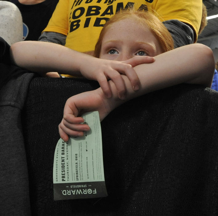 First place, Photographer of the Year - Small Market - Bill Lackey / Springfield News-SunA young Barack Obama supporter holds her ticket as she listens to the president during his campaign rally in Springfield, Ohio. 