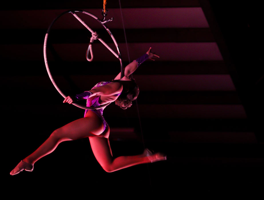 Second place, Photographer of the Year - Small Market - Barbara J. Perenic / Springfield News-SunA trapeze artist performs with the Great American Family Circus inside the Champions Center at the fairgrounds.