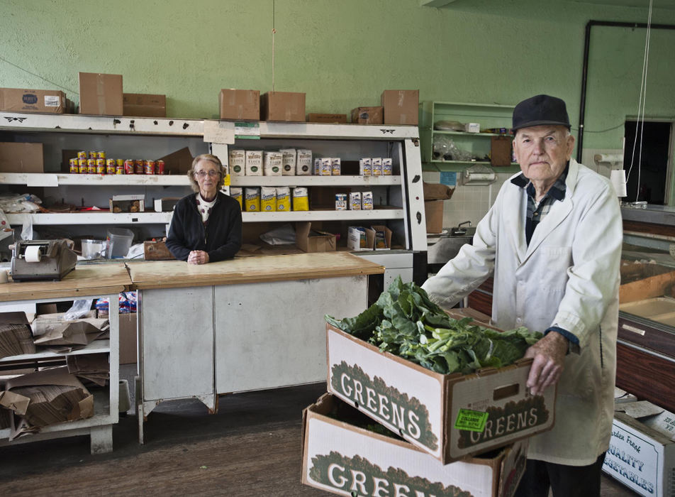 First place, Portrait Personality - Phil Long / FreelanceCato "Smitty" Smith, 96, is shown at his small grocery in Akron, with his wife Nola, 86. Smitty was being forced to close his grocery because the building owner went bankrupt. 