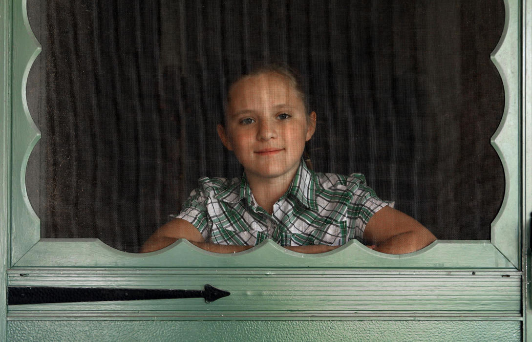 Award of Excellence, Portrait Personality - Eric Albrecht / The Columbus DispatchMia Stephany, 13, has a anxiety disorder, that includes a reluctance to go outside at times but with support  from doctors and her family she is managing her anxiety.