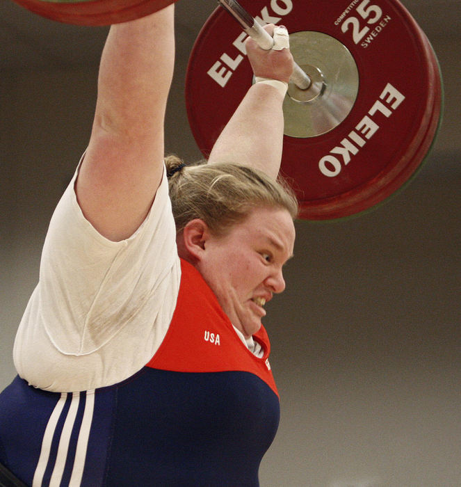 Award of Excellence, Sports Portfolio - Kyle Robertson / The Columbus DispatchHolley Mangold pulls the bar over her head during a Clean & Jerk in the 2012 Olympic Trials for Women's Weightlifting at the Greater Columbus Convention Center in Columbus, March 4, 2012. 
