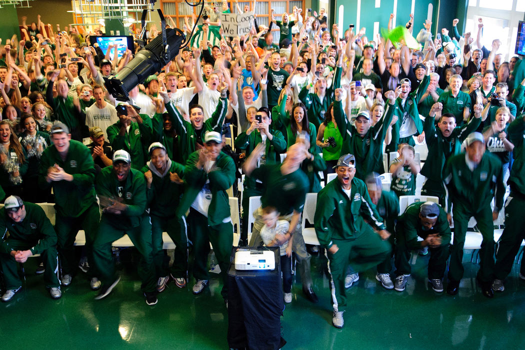 First place, Sports Portfolio - Joel Hawksley / Ohio UniversityThe Bobcats celebrate when their name is called during the selection show at Baker University Center in Athens.