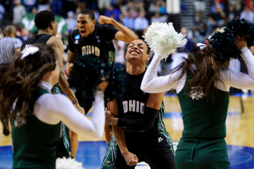 First place, Sports Portfolio - Joel Hawksley / Ohio UniversityStevie Taylor celebrates with the Bobcats after their 62-56 win over South Florida for a spot in the Sweet 16 at Bridgestone Arena in Nashville, Tenn. 