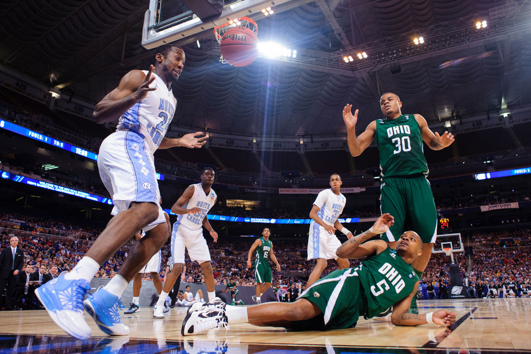 First place, Sports Portfolio - Joel Hawksley / Ohio UniversityD.J. Cooper can only watch as a rebound falls out of bounds during the Bobcats' 73-65 overtime loss to North Carolina.