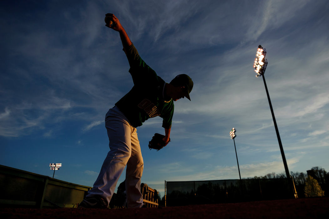 First place, Sports Portfolio - Joel Hawksley / Ohio UniversityOhio pitcher Shane Cole warms up in the bullpen during the Bobcats' game against Wright State at Bob Wren Field in Athens.