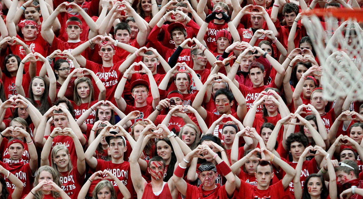 Award of Excellence, Sports Portfolio - John Kuntz / The Plain DealerChardon High School students form a heart with their hands as a Chardon player attempts free throws March 1, 2012 during a Division I sectional semifinal game at Euclid High School.  