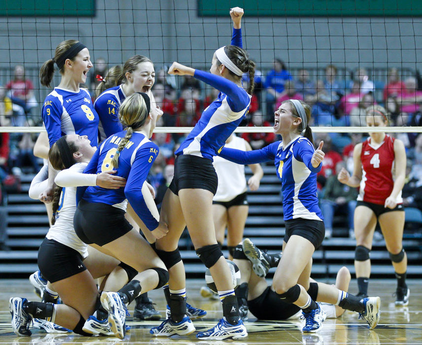 Award of Excellence, Sports Portfolio - Barbara J. Perenic / Springfield News-SunMarion Local players reacts to a 3-0 win over Buckeye Central in a Division IV state semi-final volleyball match against Buckeye Central.