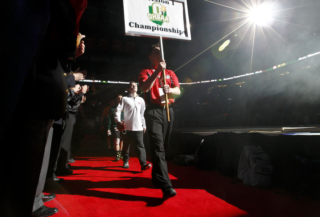 Award of Excellence, Sports Portfolio - Barbara J. Perenic / Springfield News-SunWrestlers enter the arena during the Parade of Champions before the finals of the OSHAA State Wrestling Tournament.