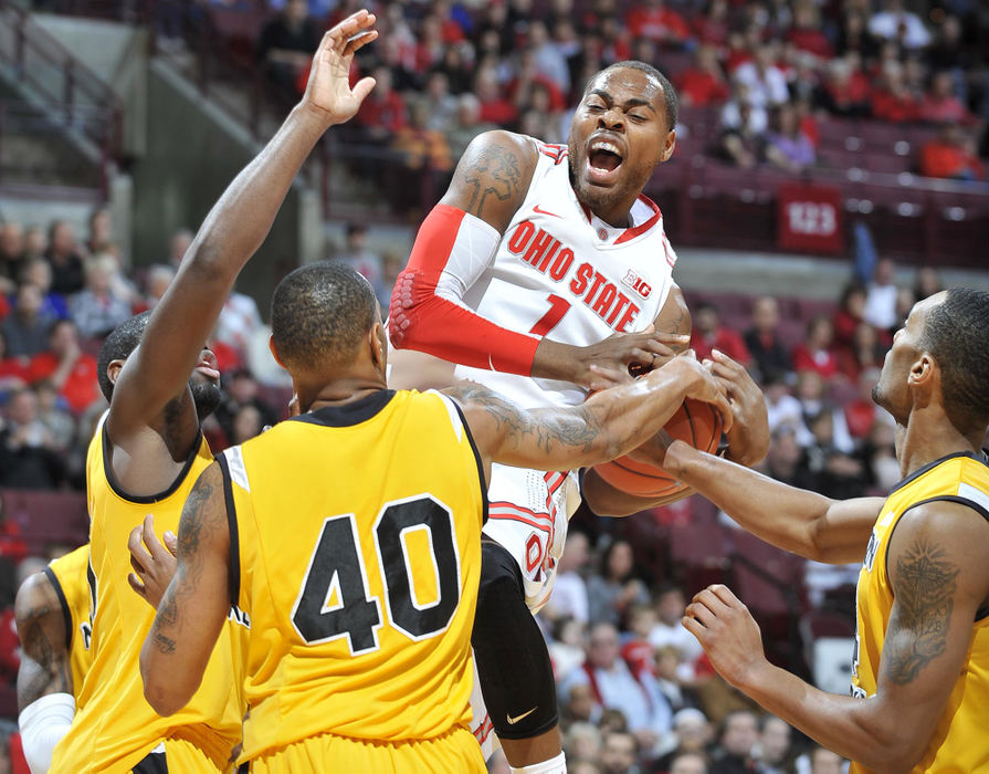 Award of Excellence, Sports Portfolio - Eamon Queeney / The Columbus DispatchOhio State Buckeyes forward Deshaun Thomas (1) reacts as he comes down with an offensive rebound in the first half of the NCAA basketball game at Value City Arena in Columbus, Saturday afternoon, December 1, 2012. As of half time the Ohio State Buckeyes led the Northern Kentucky Norse 36 - 22.