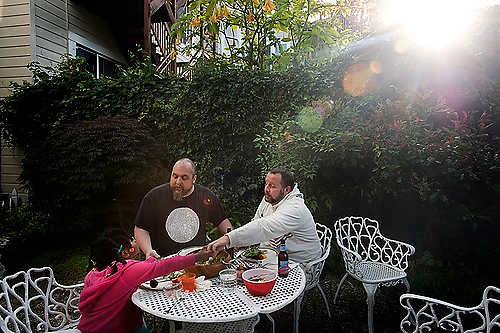 First place, Student Photographer of the Year - Meg Roussos / Ohio University The family gives their thanks before eating dinner together.