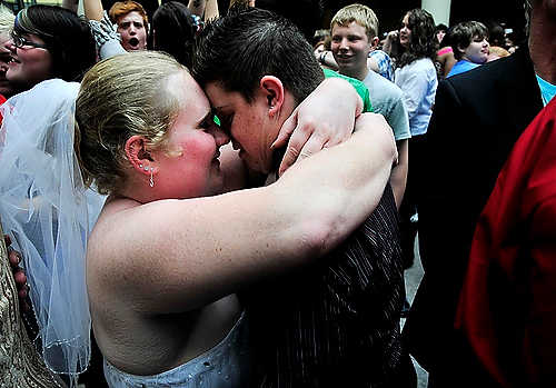 Second place, Student Photographer of the Year - Hannah Potes / Kent State UniversityAmanda Erb, 23, and her fiancé Mel Martin, 29, of Piqua, embraced after sharing wedding vows at a mock gay marriage ceremony in Cleveland. Erb and Martin had been together for five years before deciding to marry. 