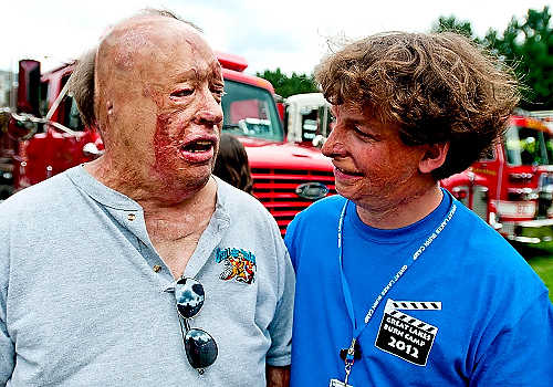 Second place, Student Photographer of the Year - Hannah Potes / Kent State UniversityKlavon catches up with burn survivor and former camper turned counselor Lee Eicher, 27, of Colon, MI, during the welcome procession at Great Lakes Burn Camp. Klavon started Great Lakes Burn Camp in the 90's to help young burn survivors find the strength to live in their new bodies. Eicher was a camper during the first few years of GLBC in the late 90's and remembers Klavon as one of his counselors.