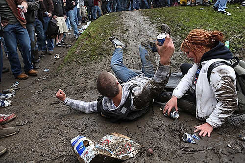 Third place, Student Photographer of the Year - Coty Giannelli / Kent State UniversityThe partygoers didn't let the wet April weather stop them from enjoying the festivities. As the day went on people embraced the bad weather: loosing clothes, jumping in puddles and even building a mudslide.