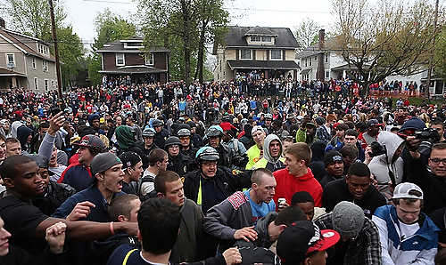 Third place, Student Photographer of the Year - Coty Giannelli / Kent State UniversityPolice officers return to College Avenue to restore order and allow medical vehicles access to the street.