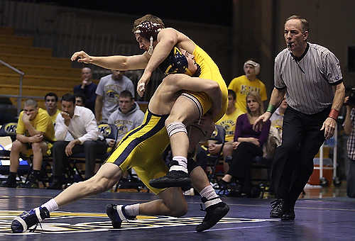 Third place, Student Photographer of the Year - Coty Giannelli / Kent State UniversityFreshman Ian Miller takes down his Central Michigan opponent in a 149 lb match. Kent State beat Central Michigan 22-13 to remain unbeaten in the Mid-American Conference