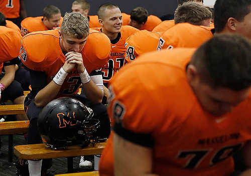 Third place, Student Photographer of the Year - Coty Giannelli / Kent State UniversityMassillon Tiger's DJ Brown reflects during halftime. The Tigers extended their 11-game win streak after they crushed the 5th ranked Fitch Falcons 34-14.