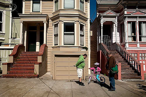 First place, Student Photographer of the Year - Meg Roussos / Ohio University Intro: Scott Barney and Scott Stauffer live in the Castro district, with their adopted daughter, Azaria, 5. Being gay parents and having a bi-racial family, they have been through trials. Barney and Scott Stauffer talk to Azaria about using her brakes properly. She had recently just got her training wheels off.