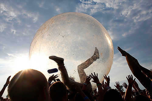 Award of Excellence, Student Photographer of the Year - Meg Vogel / Ohio UniversityFamily Force 5's lead singer Solomon Jerome Olds sings the band's opening song at Lifest, while crowd surfing in a bubble at Sunnyview Expo Center in Oshkosh, Wisconsin. 