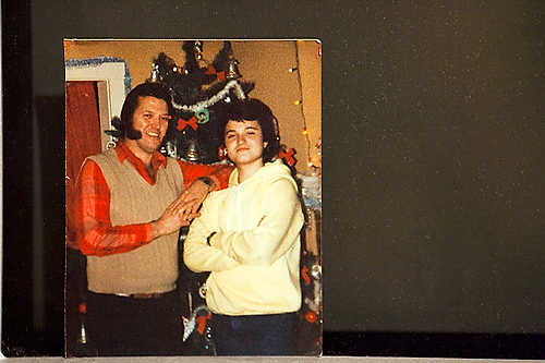 Award of Excellence, Student Photographer of the Year - Meg Vogel / Ohio UniversityA photo of Jim Forshey posing with his dad, Jim Forshey, on Christmas Eve in 1985 is taped to the basement wall where Jim practies for shows. Both father and son are Elvis tribute artists in the Parkersburg area.