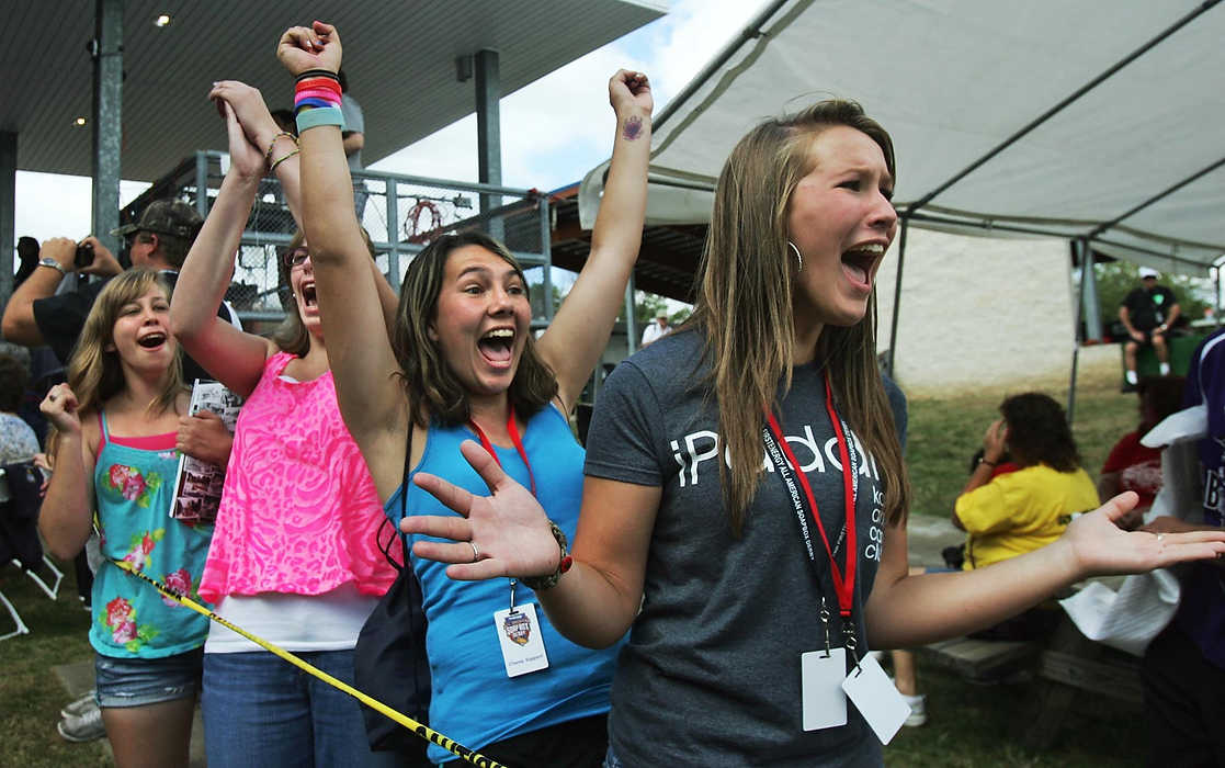 First place, Sports Picture Story - Ed Suba, Jr. / Akron Beacon Journal(right to left) Megan Gongaware, Ashley Sklack, Clare Stevenson and Emily Muernick celebrate after a racer they know wins the Stock division during the 75th annual FirstEnergy All-American Soap Box Derby at Derby Downs.