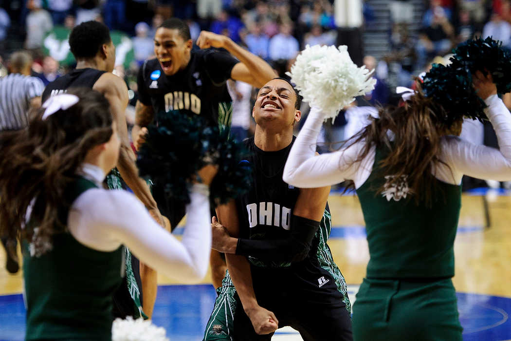 Second place, Sports Picture Story - Joel Hawksley / Ohio UniversityStevie Taylor celebrates with the Bobcats after their 62-56 win over South Florida for a spot in the Sweet 16 at Bridgestone Arena in Nashville, Tenn.