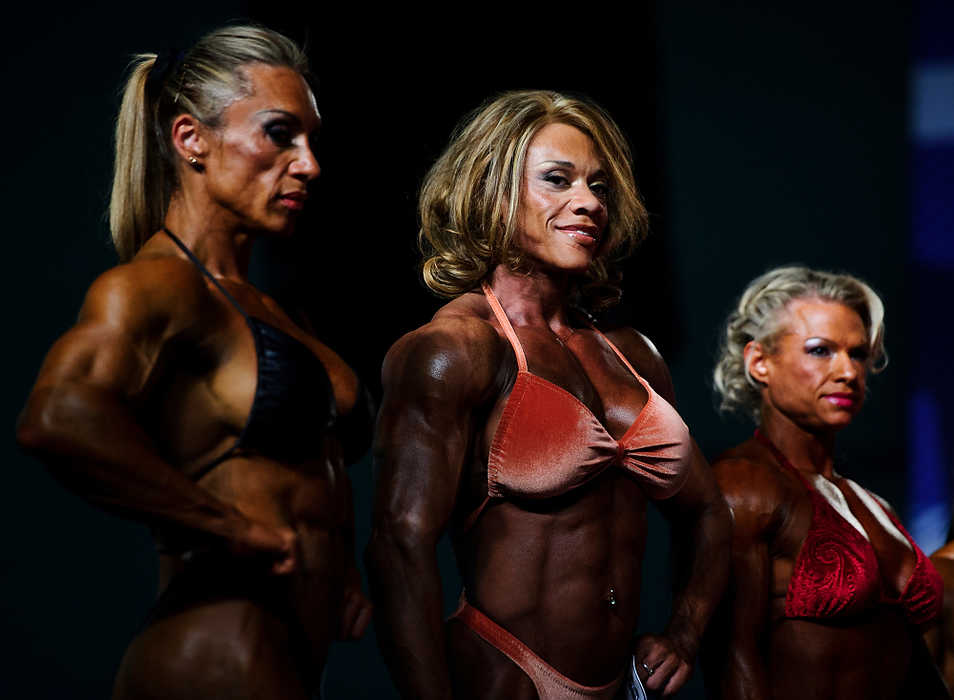 Third place, Sports Picture Story - Joel Hawksley / Ohio UniversityCompetitors in the women's amateur bodybuilding finals wait their turn backstage at the Arnold Sports Festival in Columbus.