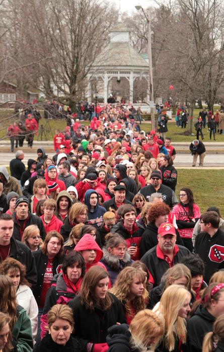 First place, Team Picture Story - Thomas Ondrey / The Plain DealerFour days after the shooting, Chardon High School students and parents march from the town square's gazebo a half mile to the high school to mark the school's reopening.  (Thomas Ondrey/The Plain Dealer)
